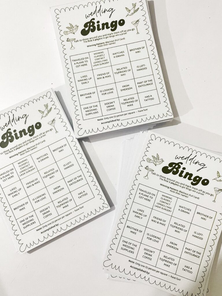 Three printed wedding bingo cards with green decorative borders and cocktail illustrations on a white background.